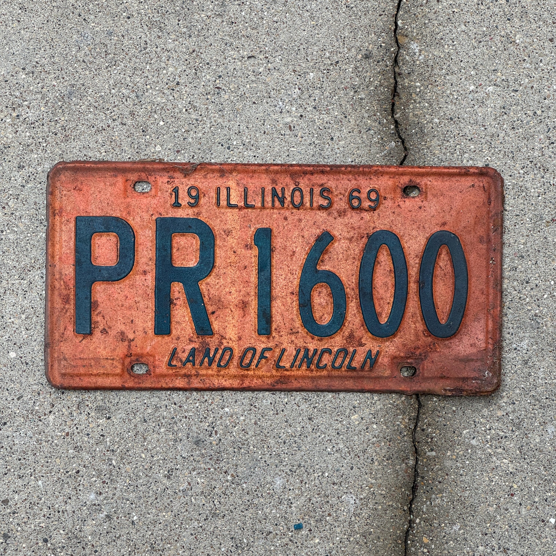 Photo of a 1969 Illinois License Plate Auto Tag 2 Vintage Garage PR 1600 with original patina