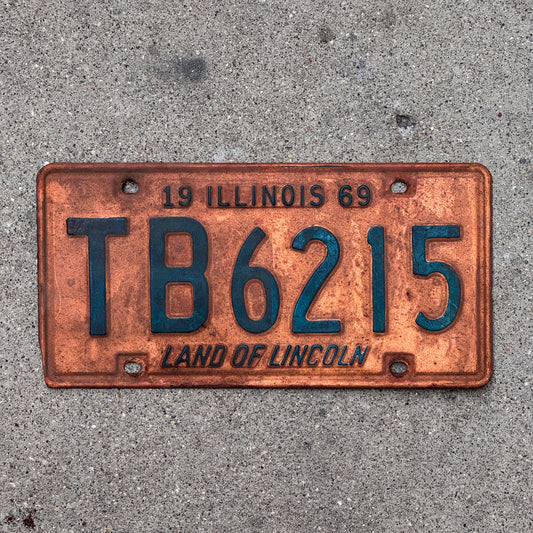 Photo of a 1969 Illinois License Plate Auto Tag 2 Vintage Garage TB 6215 with original patina