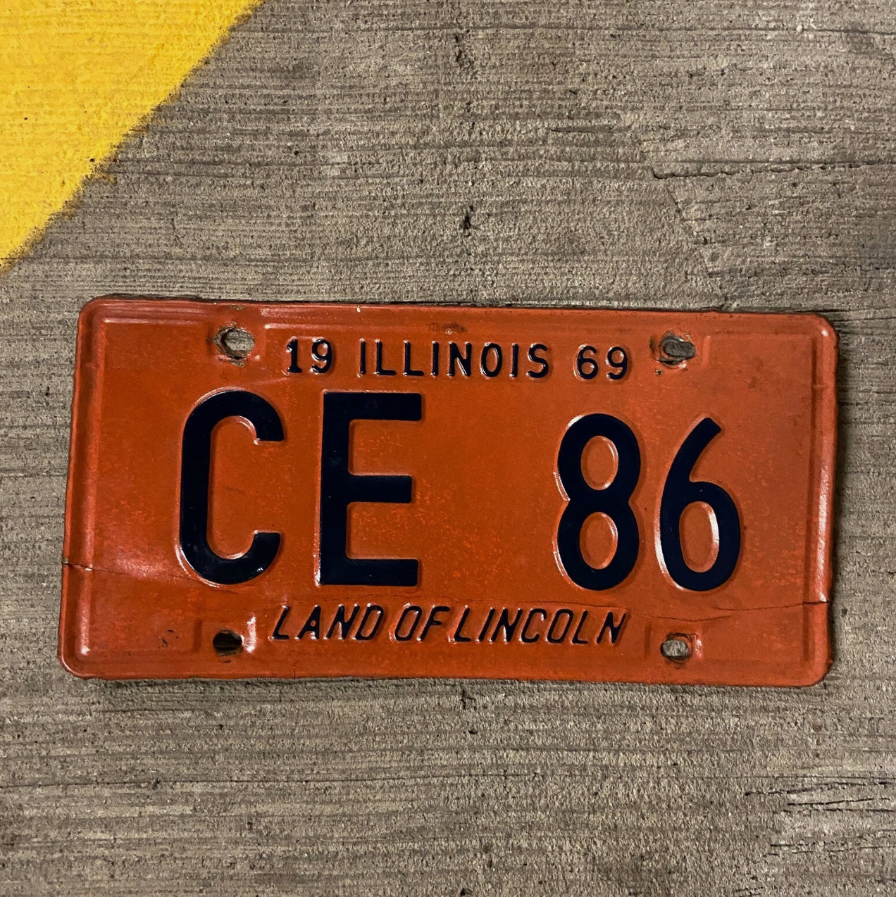Photo of a 1969 Illinois License Plate Auto Tag Garage Decor Vintage CE 86 with original patina