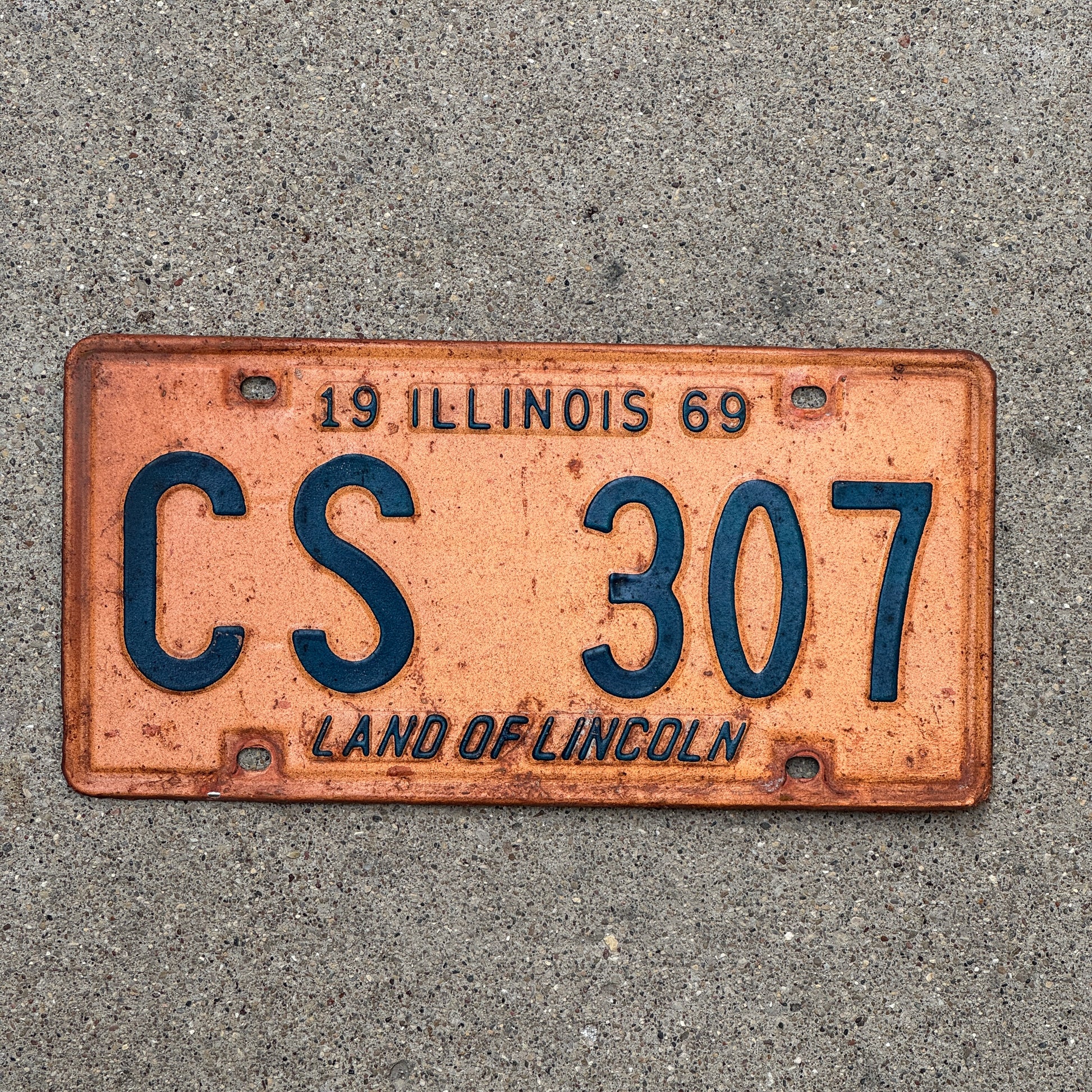 Photo of a 1969 Illinois License Plate Auto Tag Garage Decor Vintage CS 307 with original patina