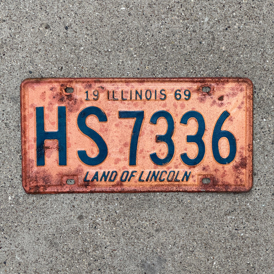 Photo of a 1969 Illinois License Plate Auto Tag Garage Decor Vintage HS 7336 with original patina