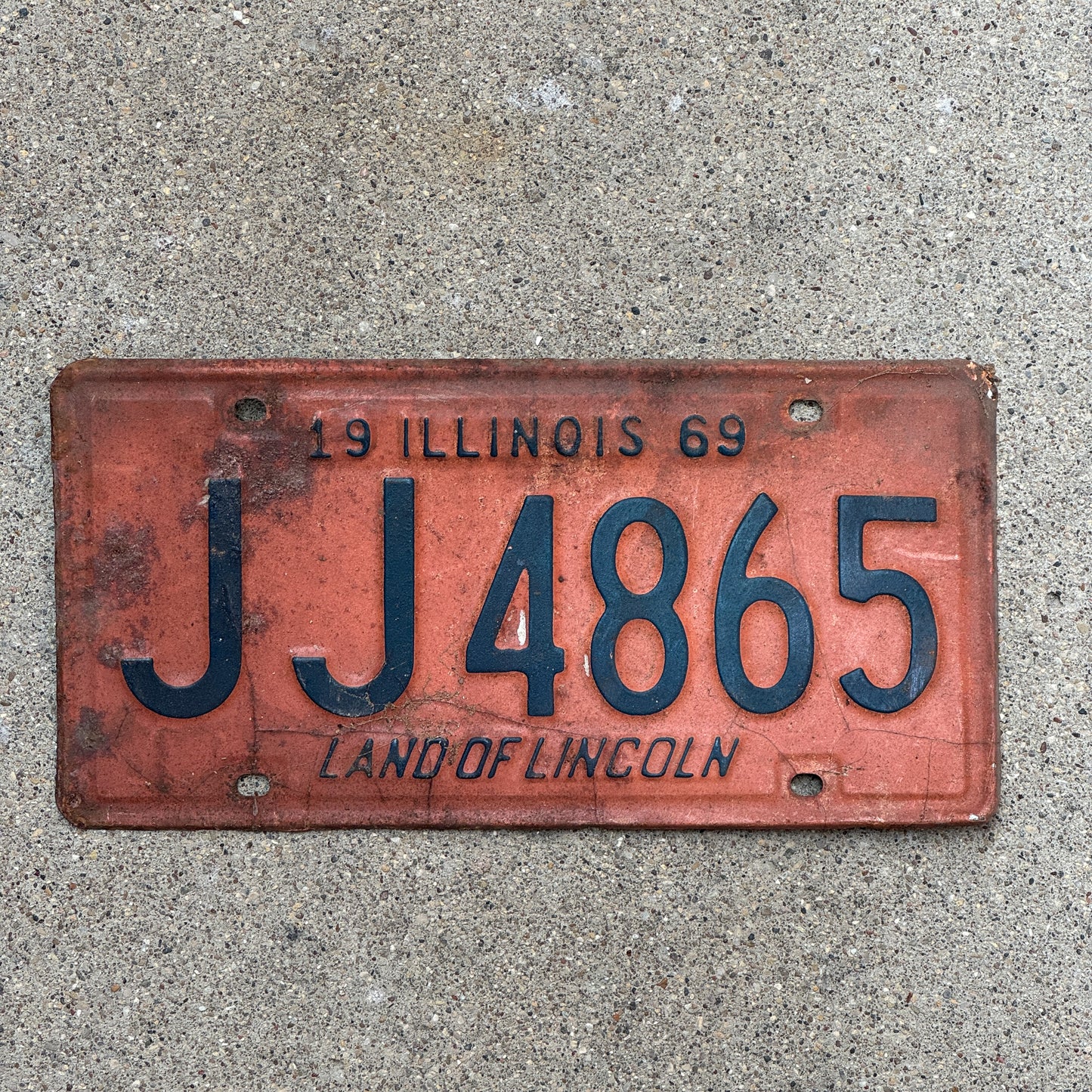 Photo of a 1969 Illinois License Plate Auto Tag Garage Decor Vintage JJ 4865 with original patina