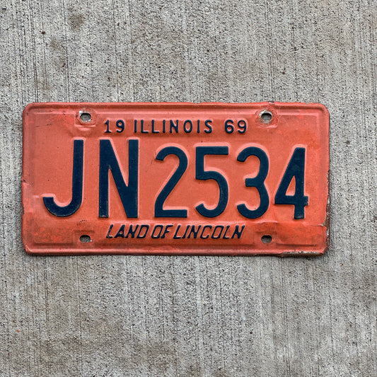 Photo of a 1969 Illinois License Plate Auto Tag Garage Decor Vintage JN 2534 with original patina