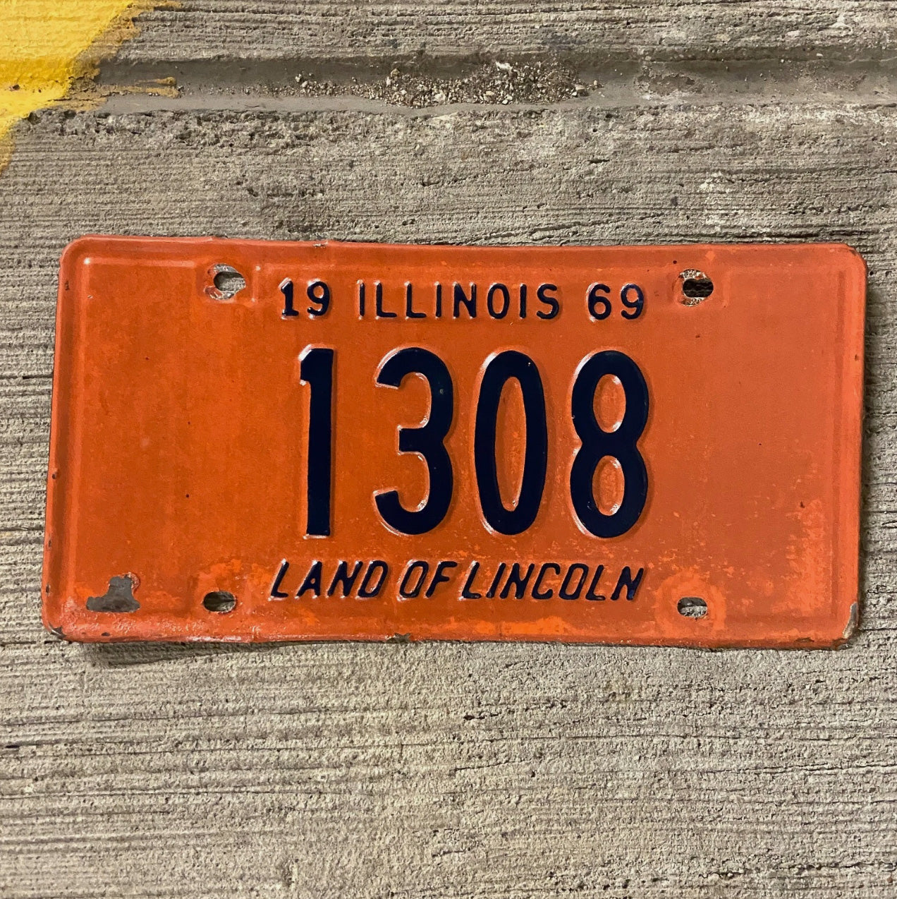 Photo of a 1969 Illinois License Plate Auto Tag Garage Decor Vintage Low Number Four Digit 1308 with original patina