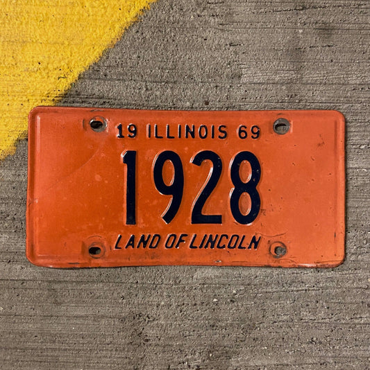Photo of a 1969 Illinois License Plate Auto Tag Garage Decor Vintage Low Number Four Digit 1928 with original patina