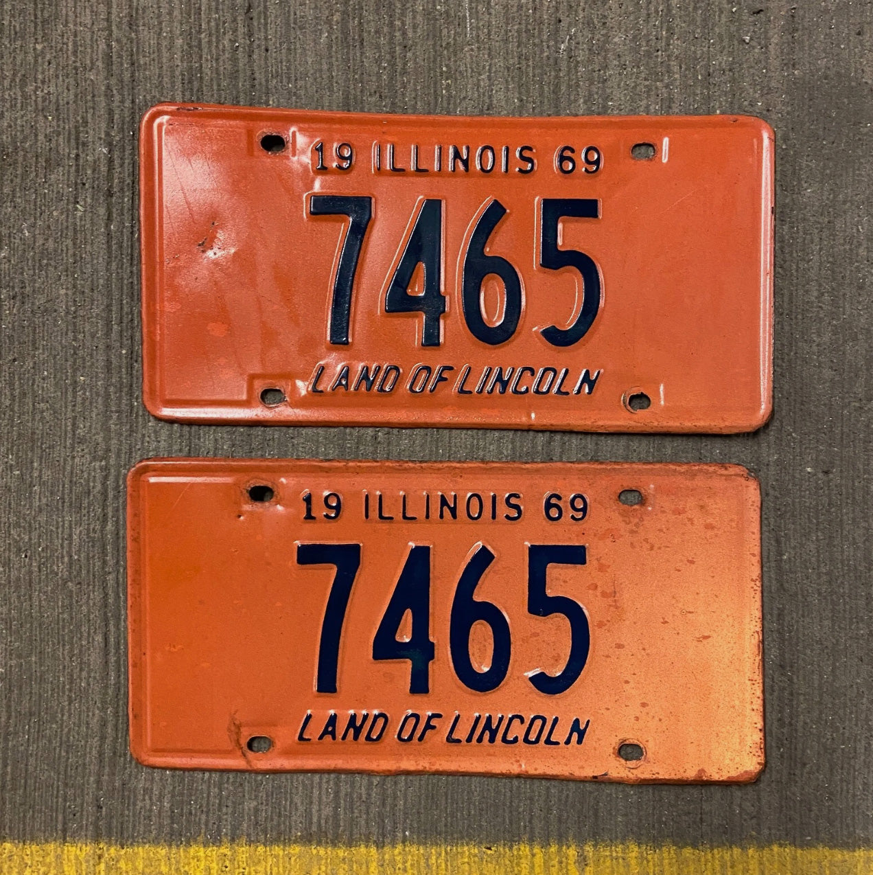 Photo of a 1969 Illinois License Plate Pair Auto Tag Garage Decor Vintage Low Number Four Digit 7465 with original patina