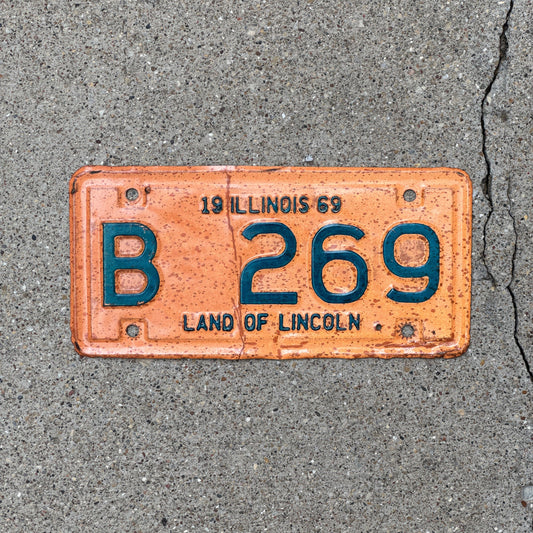 Photo of a 1969 Illinois Moped License Plate Auto Tag Garage Decor Vintage B 269