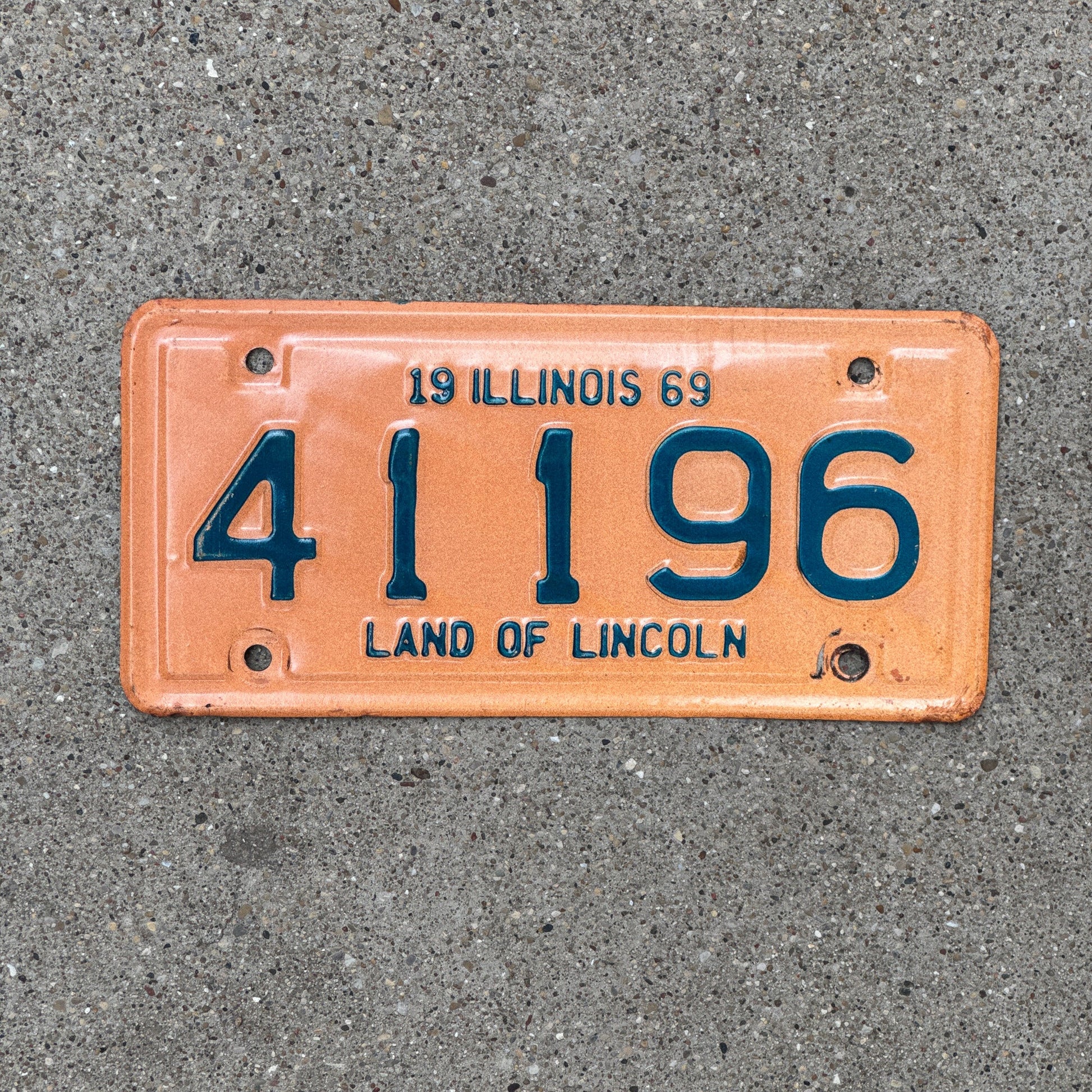 Photo of a 1969 Illinois Motorcycle License Plate Auto Tag Garage Decor Vintage 41196