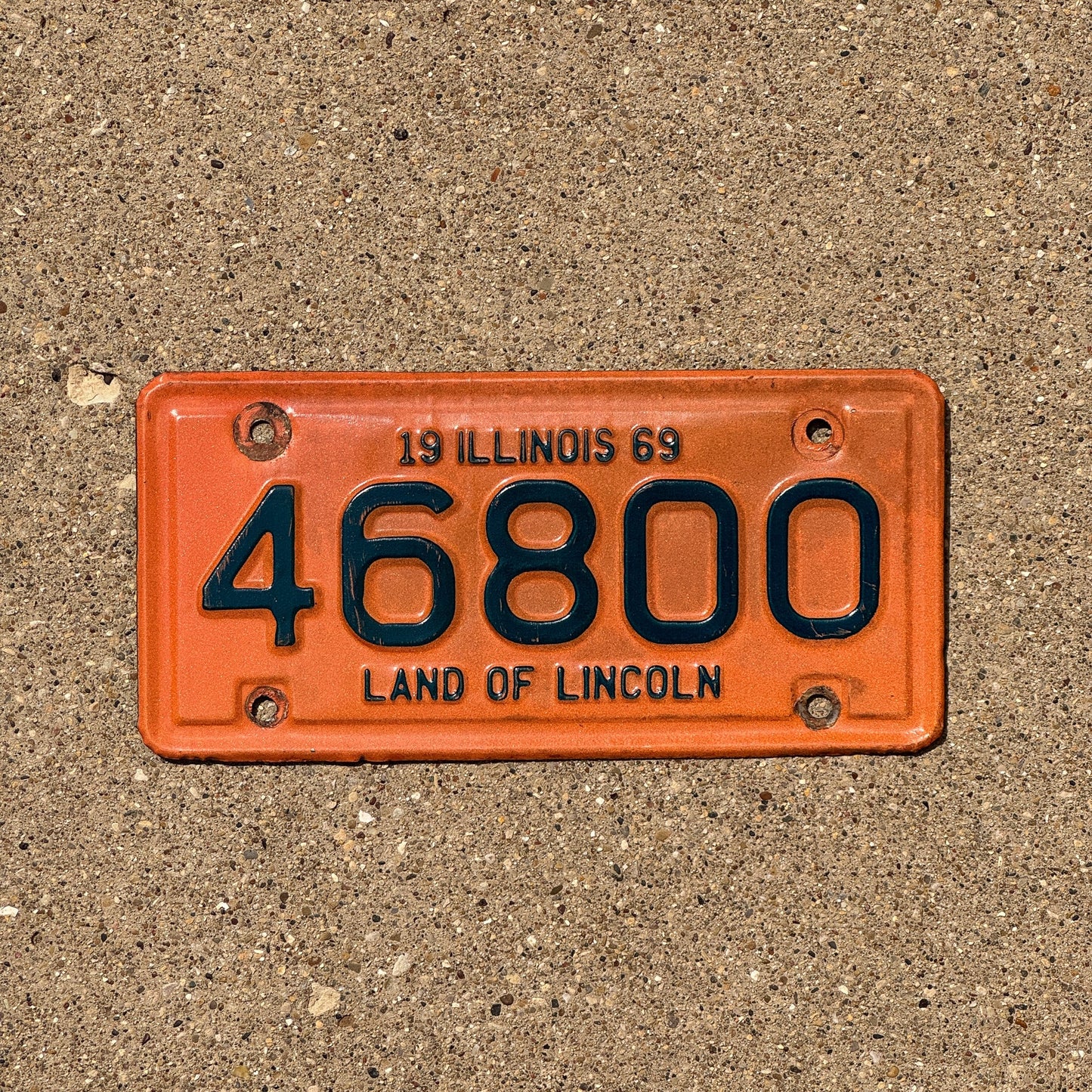 Photo of a 1969 Illinois Motorcycle License Plate Auto Tag Garage Decor Vintage 46800