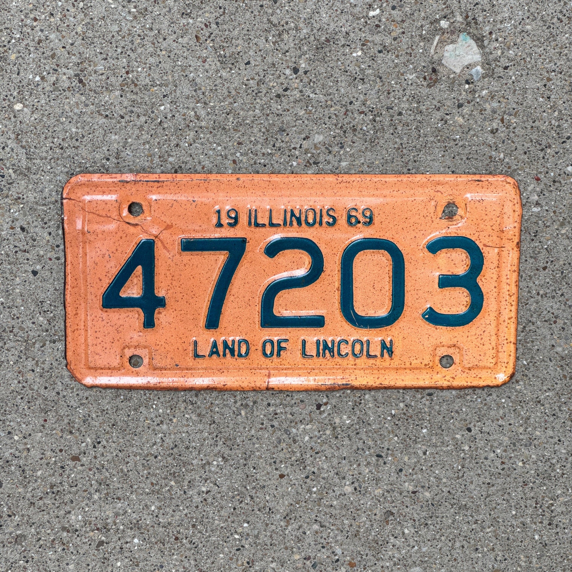 Photo of a 1969 Illinois Motorcycle License Plate Auto Tag Garage Decor Vintage 47203