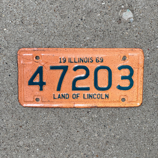 Photo of a 1969 Illinois Motorcycle License Plate Auto Tag Garage Decor Vintage 47203