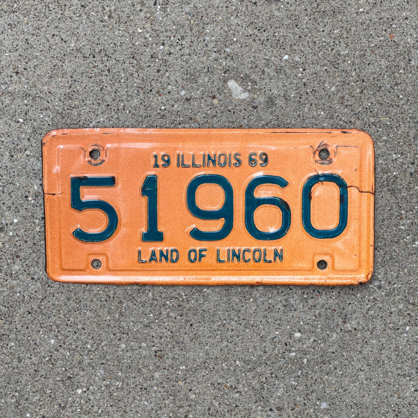 Photo of a 1969 Illinois Motorcycle License Plate Auto Tag Garage Decor Vintage 51960