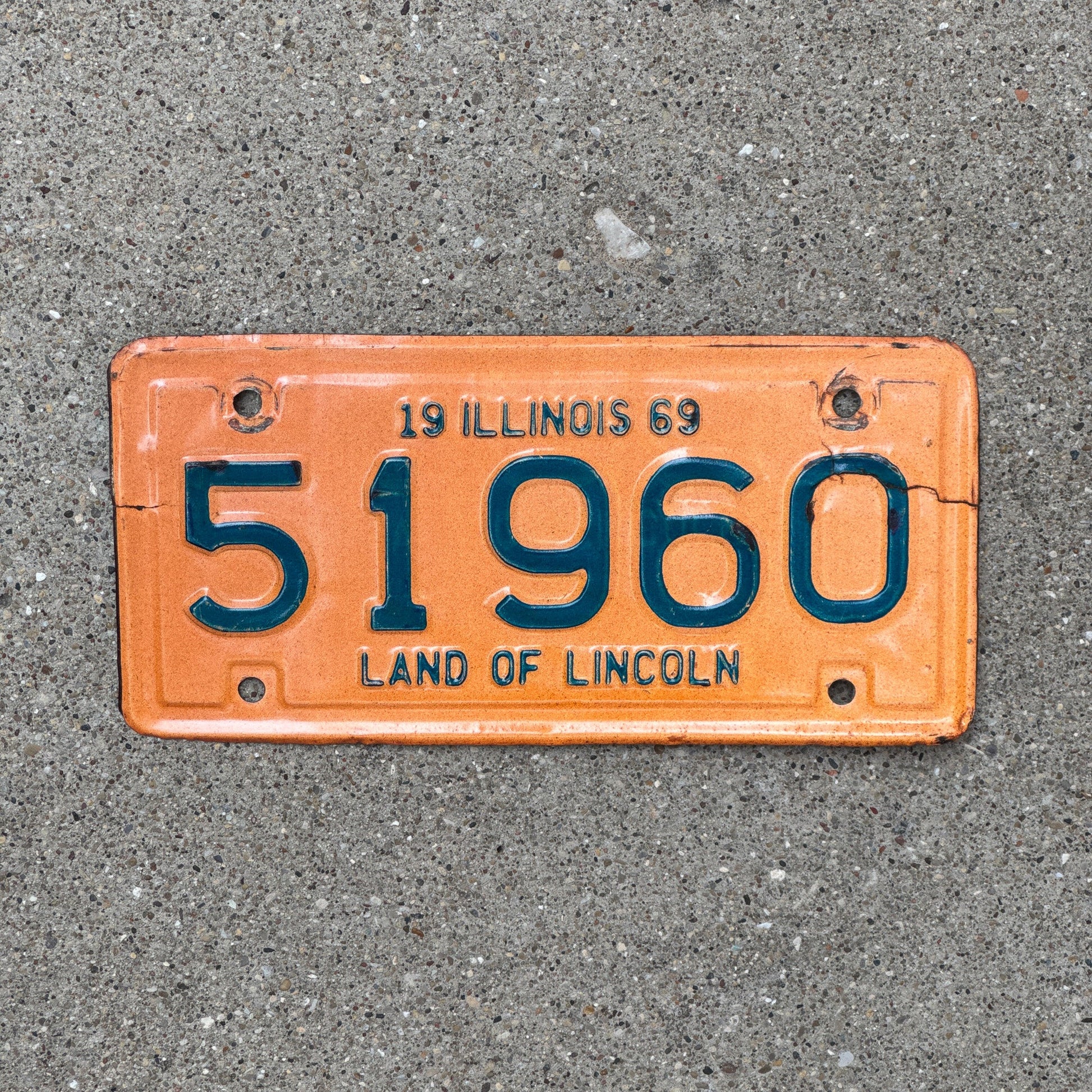 Photo of a 1969 Illinois Motorcycle License Plate Auto Tag Garage Decor Vintage 51960