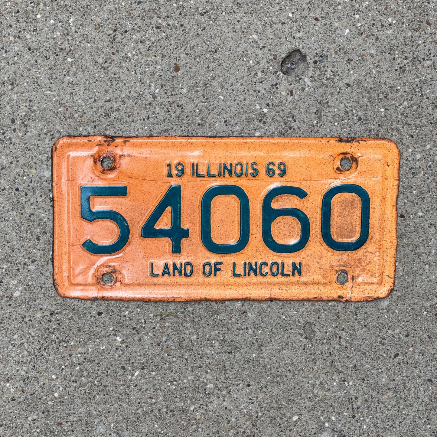 Photo of a 1969 Illinois Motorcycle License Plate Auto Tag Garage Decor Vintage 54060
