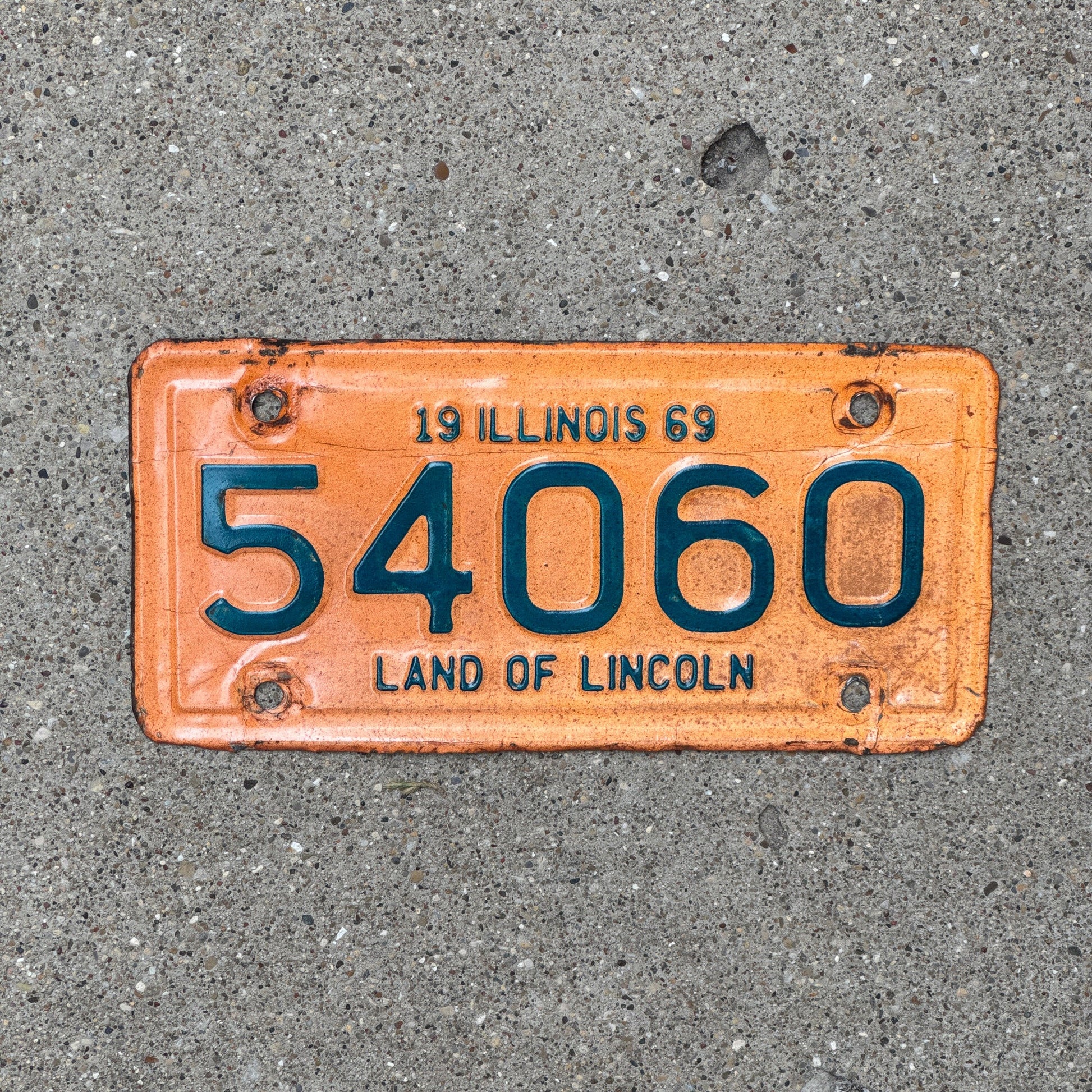 Photo of a 1969 Illinois Motorcycle License Plate Auto Tag Garage Decor Vintage 54060