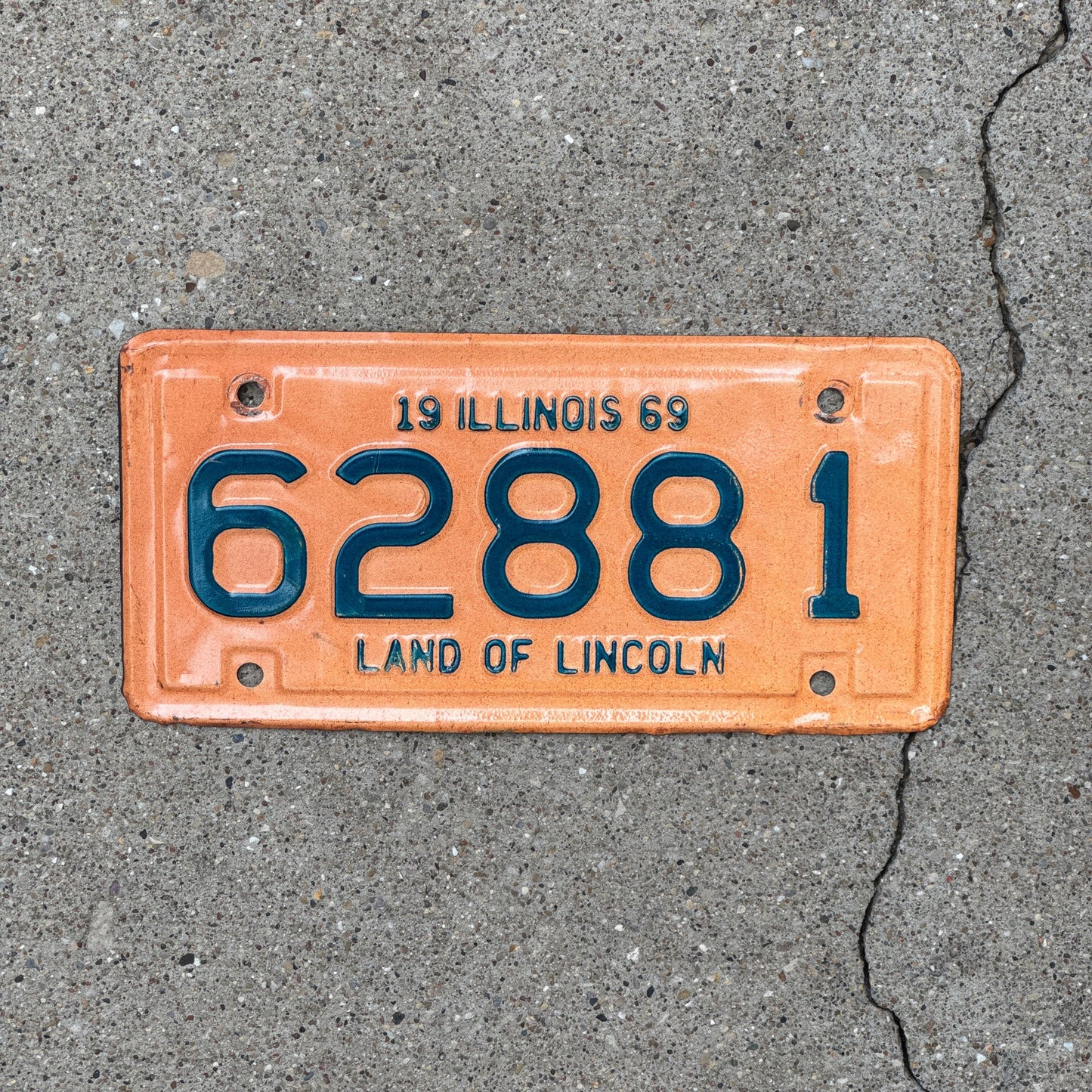 Photo of a 1969 Illinois Motorcycle License Plate Auto Tag Garage Decor Vintage 62881
