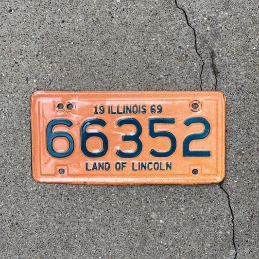 Photo of a 1969 Illinois Motorcycle License Plate Auto Tag Garage Decor Vintage 66352