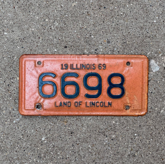 Photo of a 1969 Illinois Motorcycle License Plate Auto Tag Garage Decor Vintage 6698 with original patina