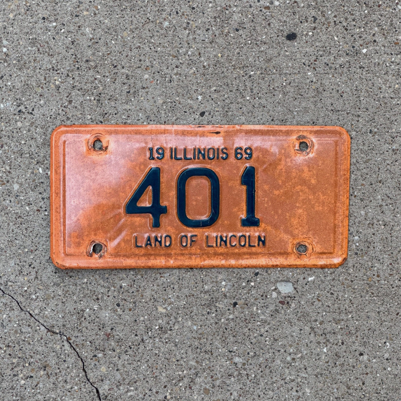 Photo of a 1969 Illinois Motorcycle License Plate Auto Tag Garage Decor Vintage Low Number Three Digit 401 with original patina