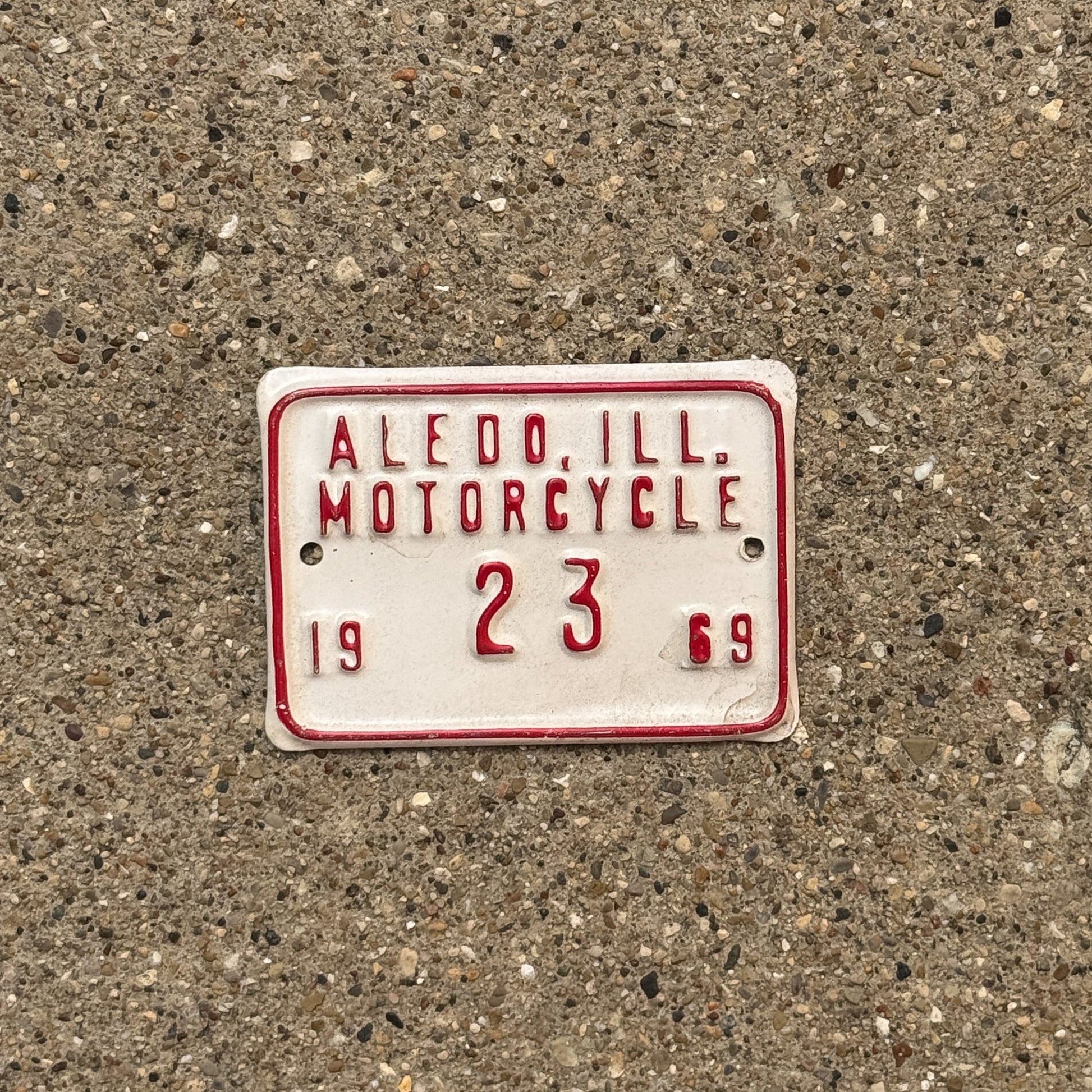 Photo of a 1969 Illinois Motorcycle Tax Tag Auto Tag Garage Decor Vintage Aledo 23