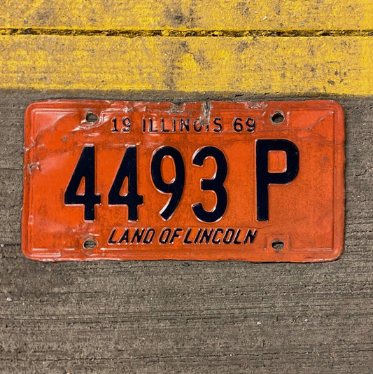 Photo of a 1969 Illinois Truck License Plate Auto Tag Garage Decor Vintage 4493 P with original patina