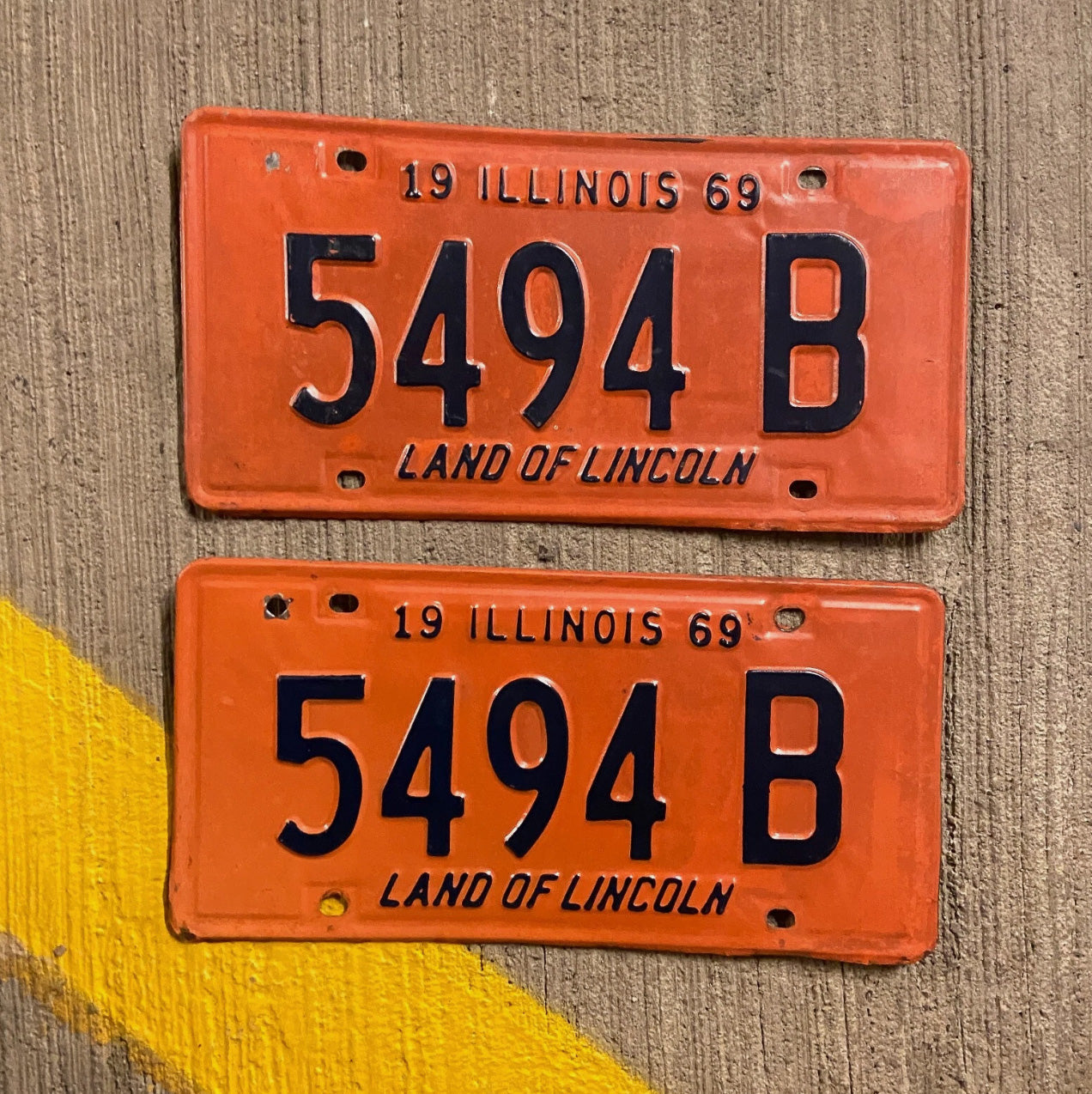 Photo of a 1969 Illinois Truck License Plate Pair Auto Tag 1 Vintage Garage 5494 B with original patina