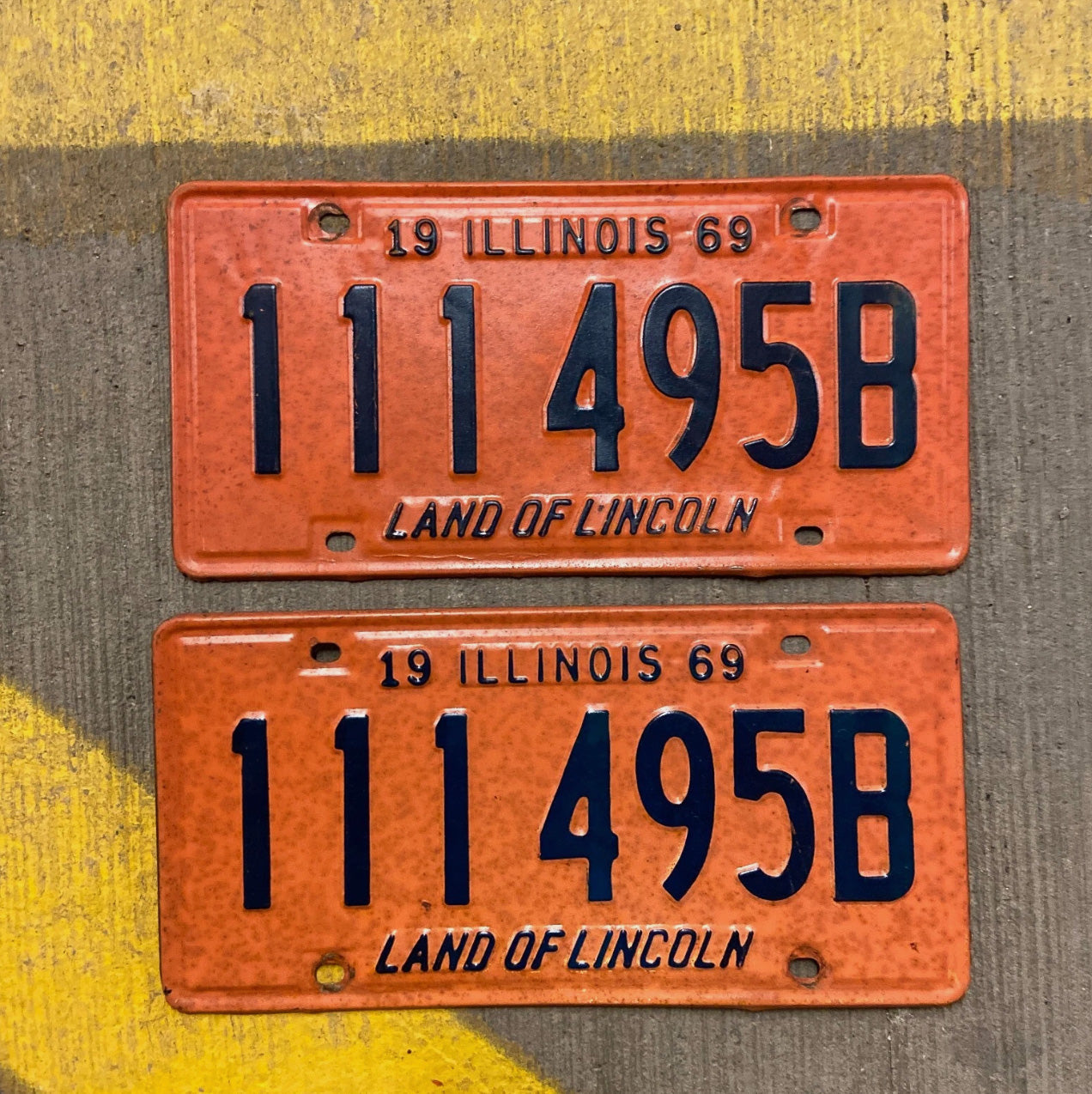 Photo of a 1969 Illinois Truck License Plate Pair Auto Tag Garage Decor Vintage Repeat Repeating 111 495 B with original patina