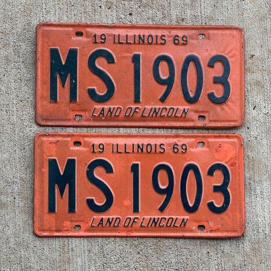 Photo of a 1969 Illinois Truck Mileage Tax License Plate Pair Auto Tag Garage Decor Vintage MS 1903 with original patina