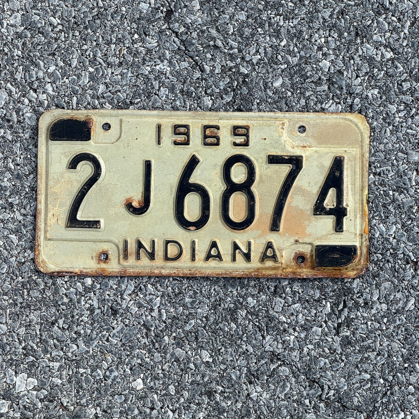 Photo of a 1969 Indiana License Plate Auto Tag Garage Decor Vintage 2J6874