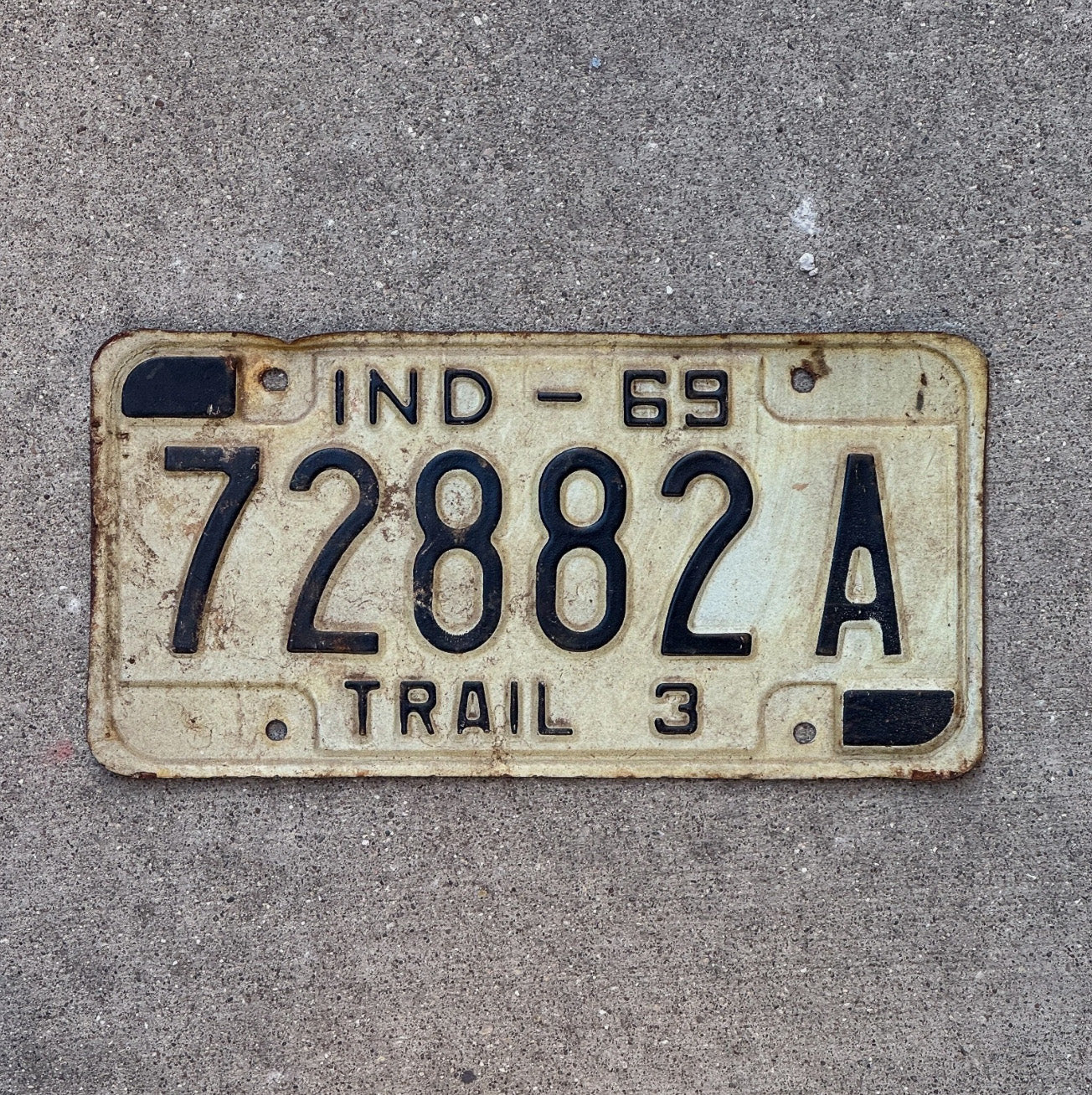 Photo of a 1969 Indiana Trailer License Plate Auto Tag Garage Decor 72882 A