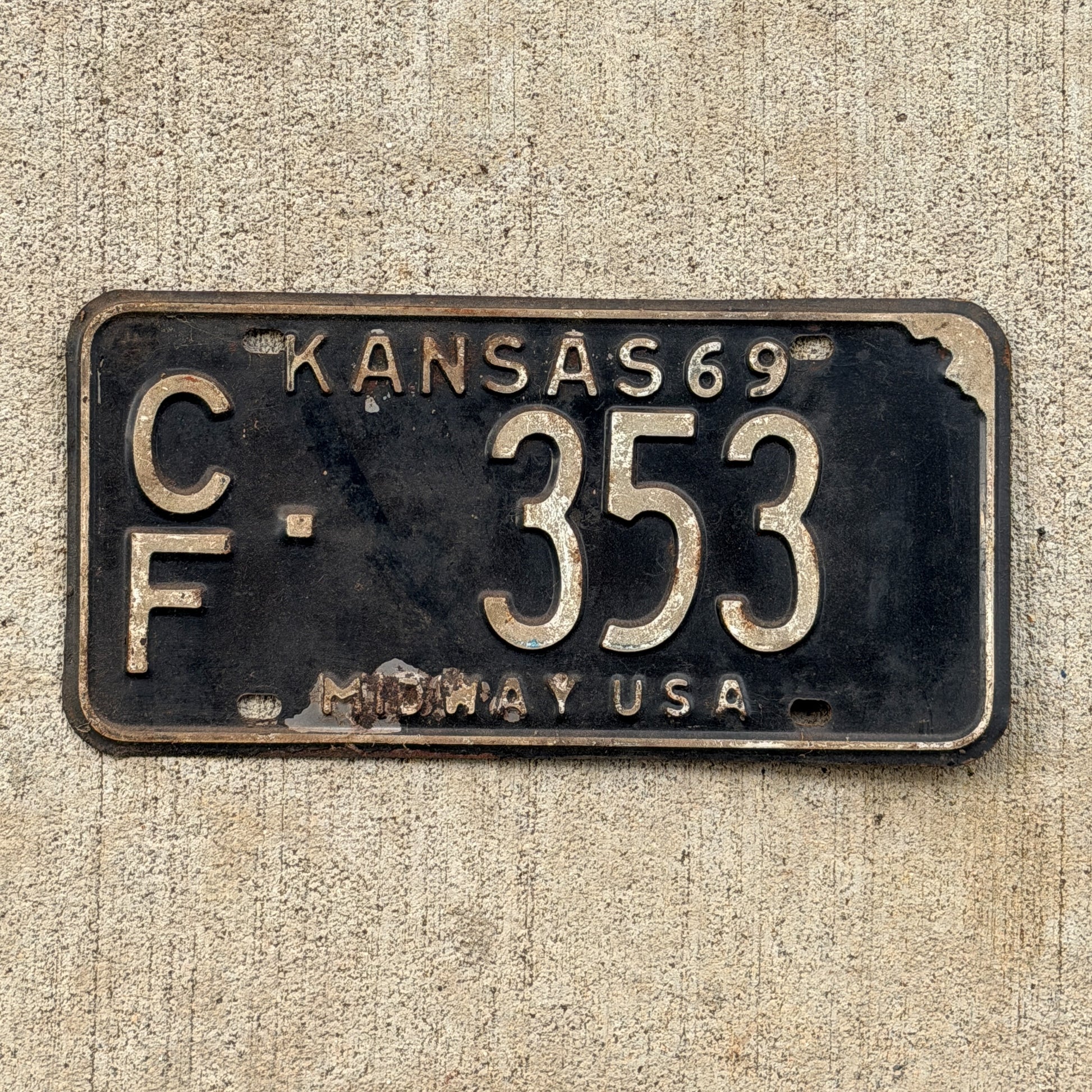 Photo of a 1969 Kansas License Plate Auto Tag Garage Decor Vintage CF 353 with original patina