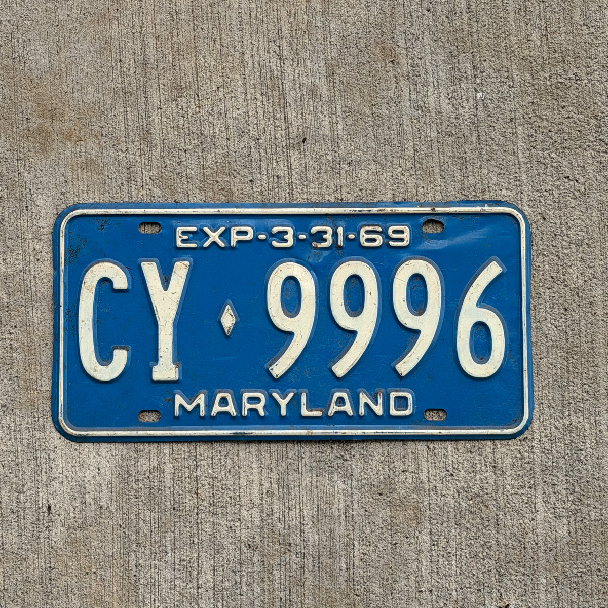 Photo of a 1969 Maryland License Plate Auto Tag Garage Decor Vintage Repeat Repeating CY 9996 with original patina