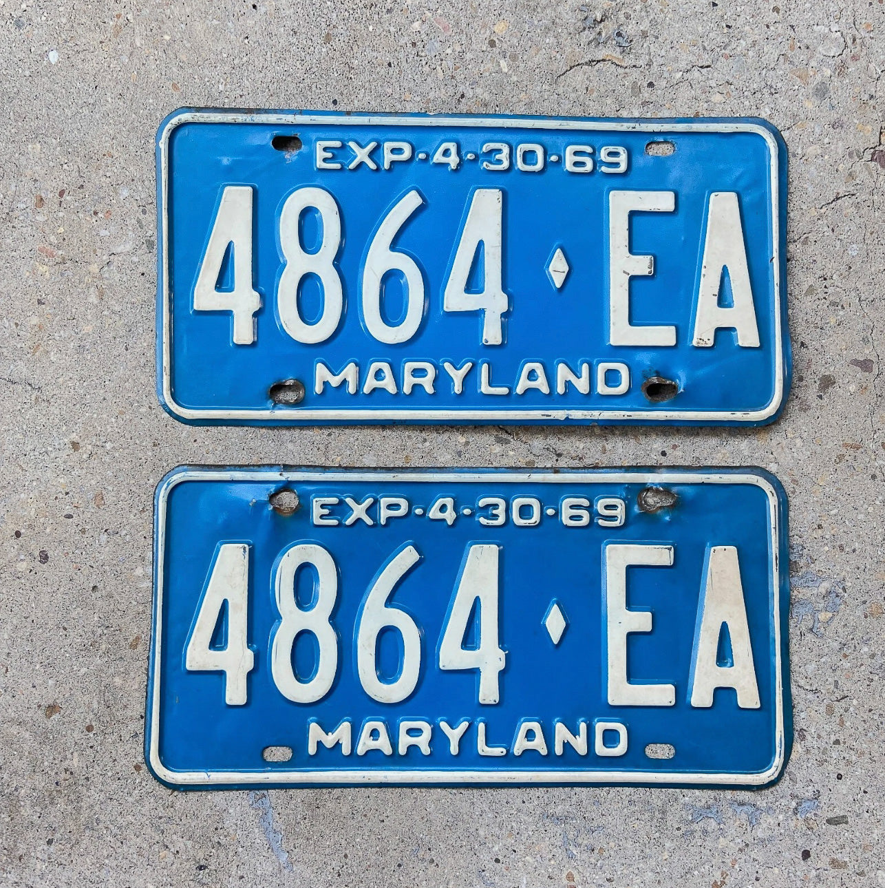 Photo of a 1969 Maryland Truck License Plate Pair Auto Tag Garage Decor Vintage 4864 EA with original patina