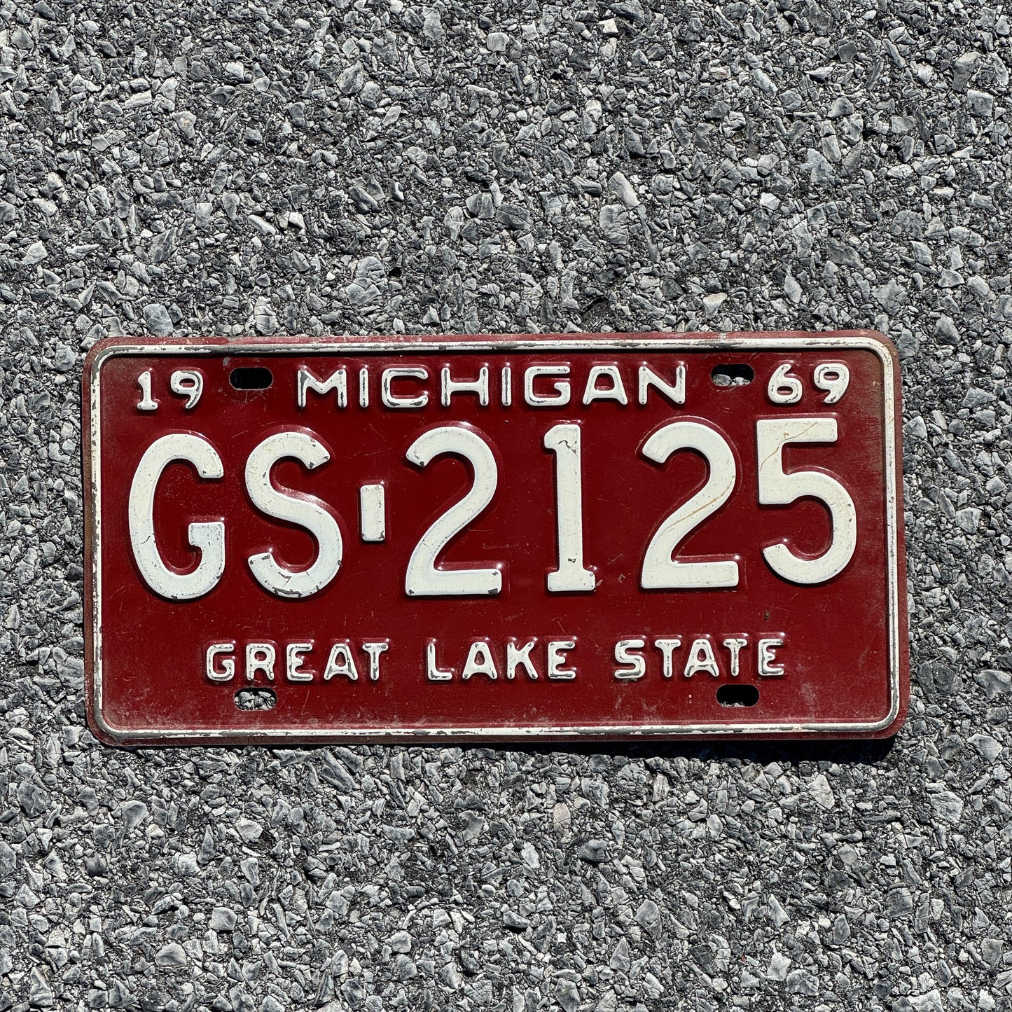 Photo of a 1969 Michigan License Plate Auto Tag Garage Decor Vintage GS 2125