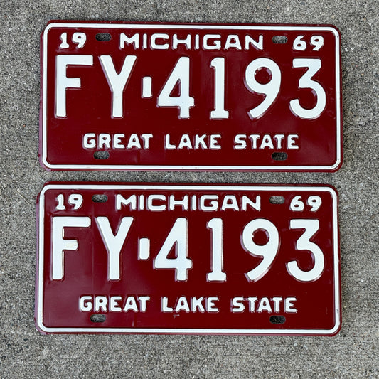 Photo of a 1969 Michigan License Plate Pair Auto Tag Garage Decor Vintage FY 4193 with original patina