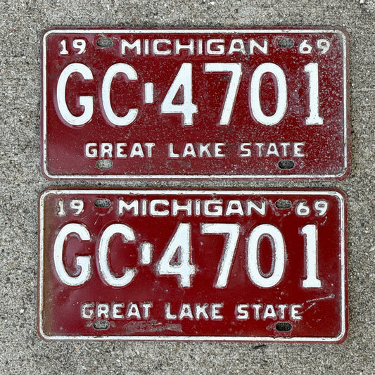 Photo of a 1969 Michigan License Plate Pair Auto Tag Garage Decor Vintage GC 4701 with original patina