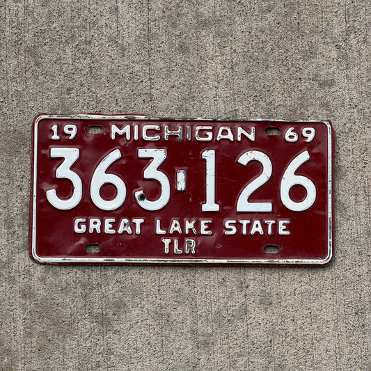 Photo of a 1969 Michigan Trailer License Plate Auto Tag Garage Decor Vintage 363 126 with original patina