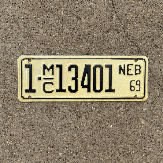 Photo of a 1969 Nebraska Motorcycle License Plate Auto Tag Garage Decor Vintage 1C 13401 with original patina