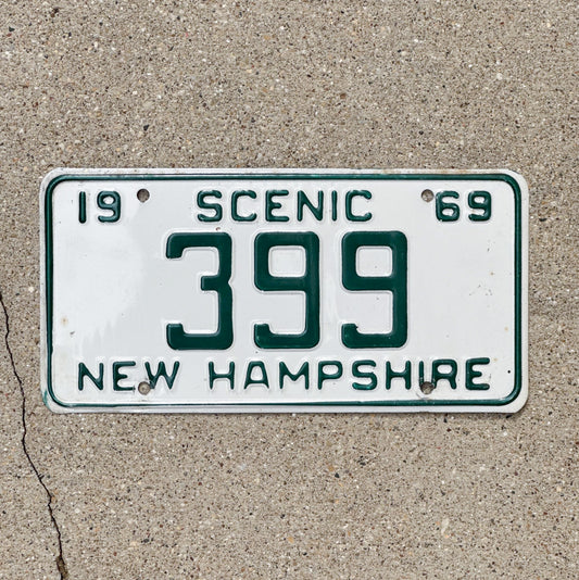 Photo of a 1969 New Hampshire License Plate Auto Tag 1 Vintage Garage Low Number Three Digit 399 with original patina