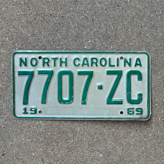 Photo of a 1969 North Carolina Trailer License Plate Auto Tag Garage Decor Vintage 7707 ZC with original patina