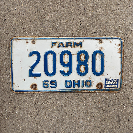 Photo of a 1969 Ohio Farm License Plate Auto Tag Garage Decor Vintage 20980 with original patina