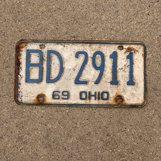 Photo of a 1969 Ohio License Plate Auto Tag 2 Vintage Garage BD 2911 with original patina