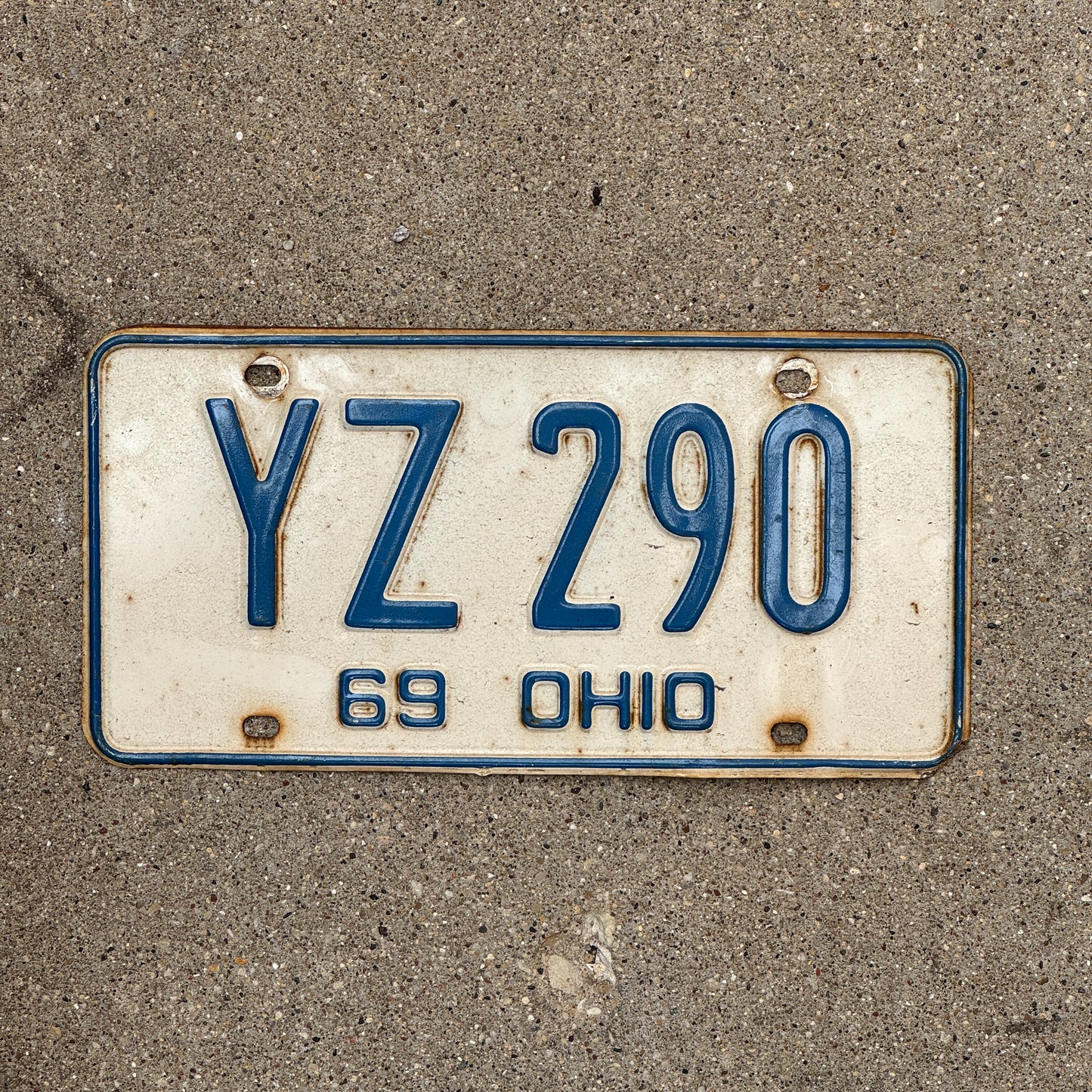 Photo of a 1969 Ohio License Plate Auto Tag 2 Vintage Garage YZ 290 with original patina