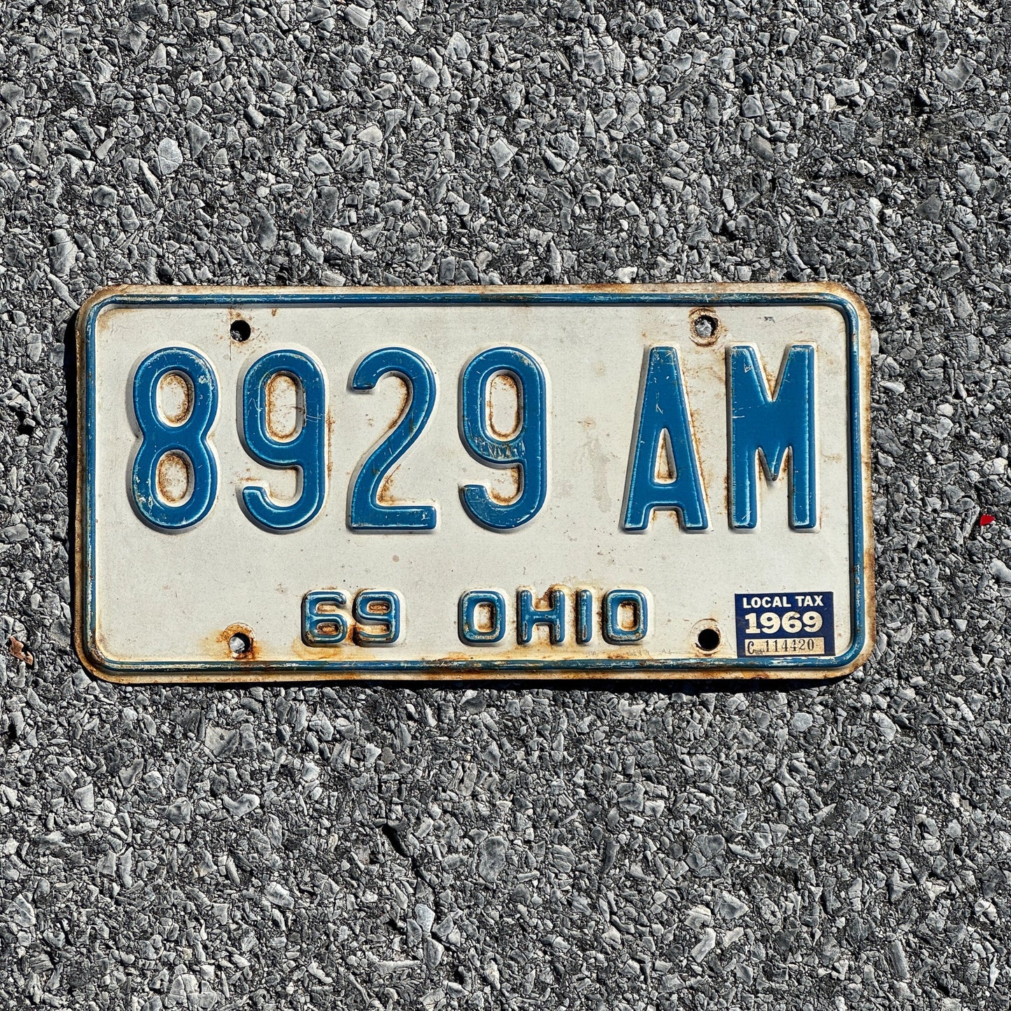 Photo of a 1969 Ohio License Plate Auto Tag Garage Decor Vintage 8929 AM