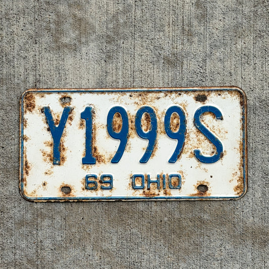 Photo of a 1969 Ohio License Plate Auto Tag Garage Decor Vintage Repeat Repeating Y 1999 S with original patina