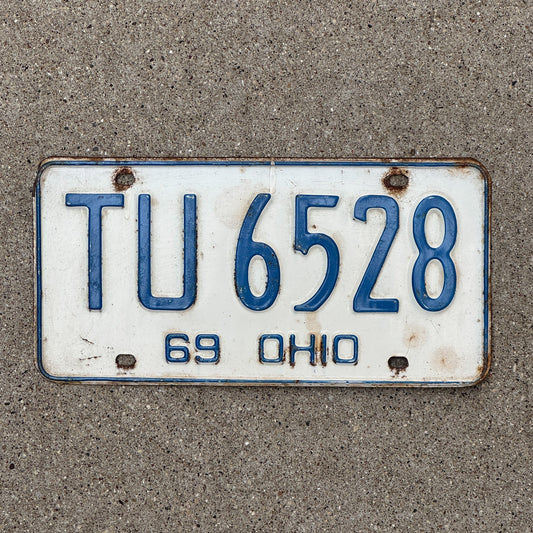 Photo of a 1969 Ohio License Plate Auto Tag Garage Decor Vintage TU 6528 with original patina