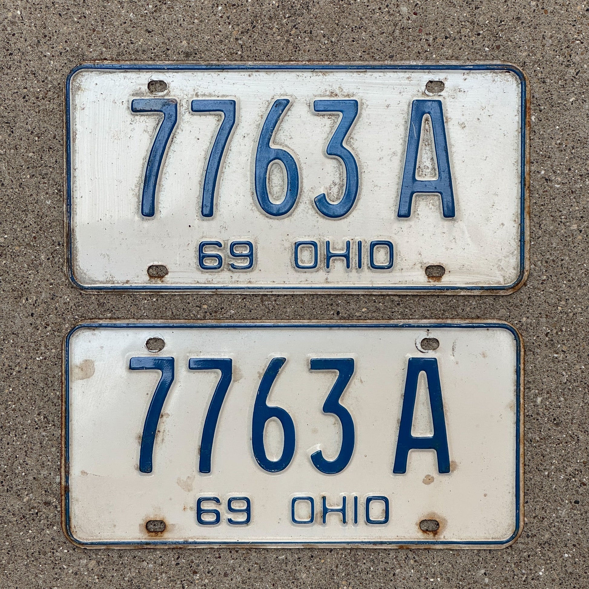 Photo of a 1969 Ohio License Plate Pair Auto Tag Garage Decor Vintage 7763 A with original patina