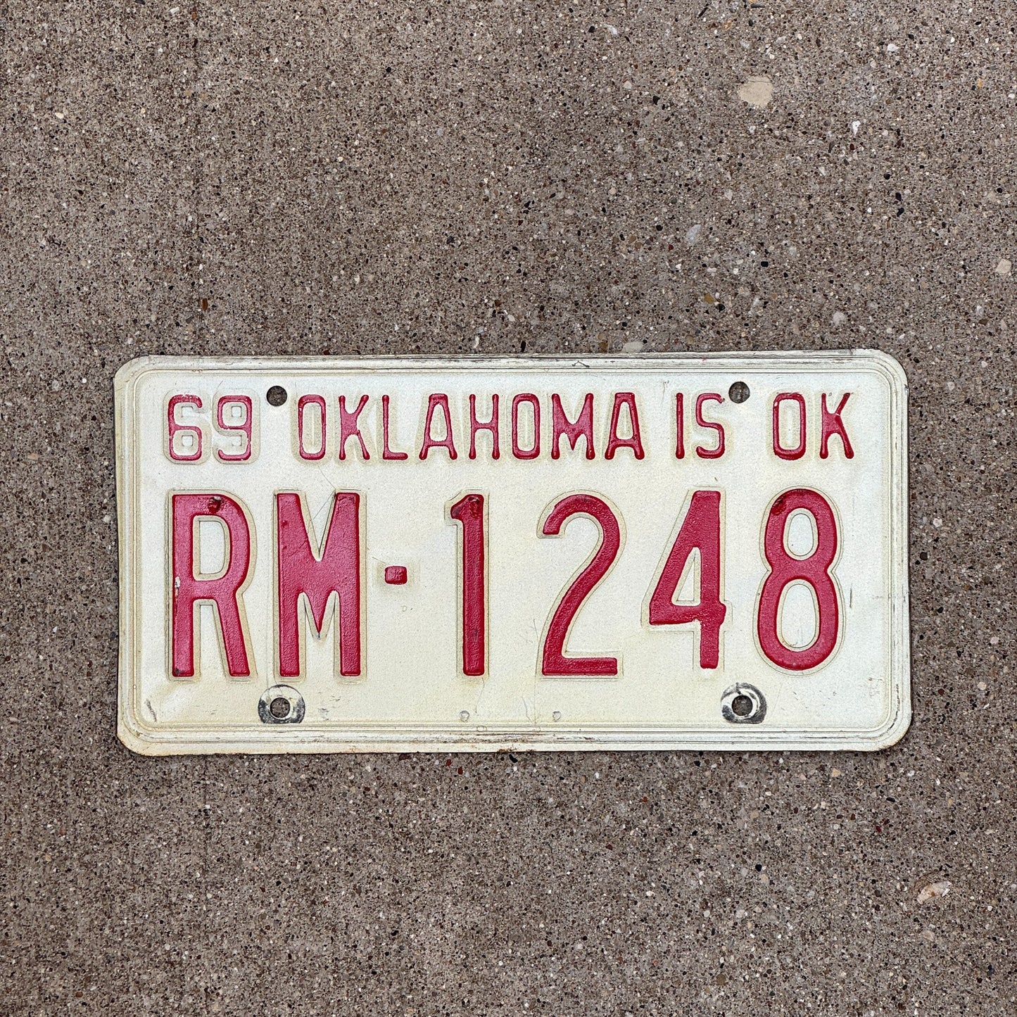 Photo of a 1969 Oklahoma License Plate Auto Tag Garage Decor Vintage RM 1248