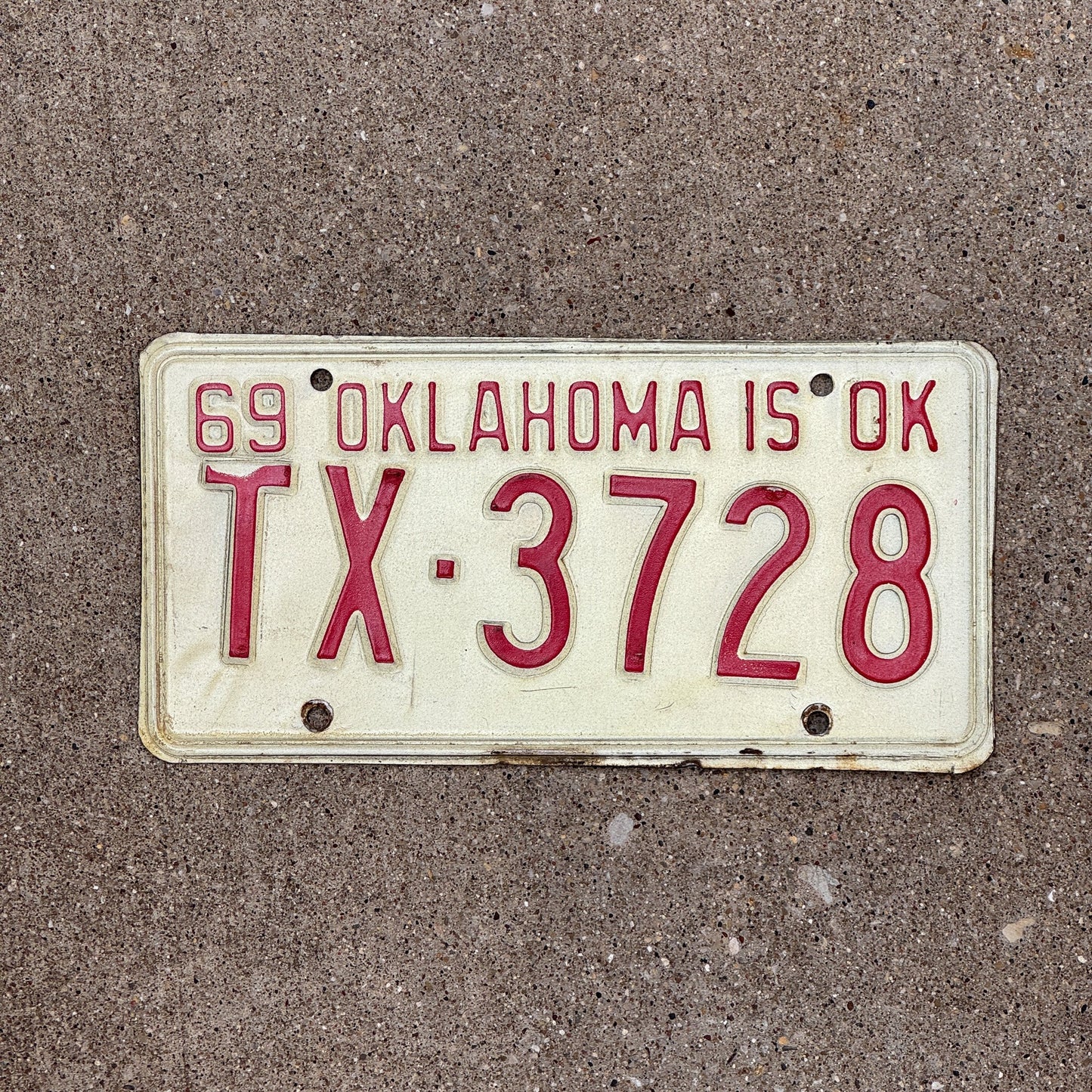 Photo of a 1969 Oklahoma License Plate Auto Tag Garage Decor Vintage TX 3728