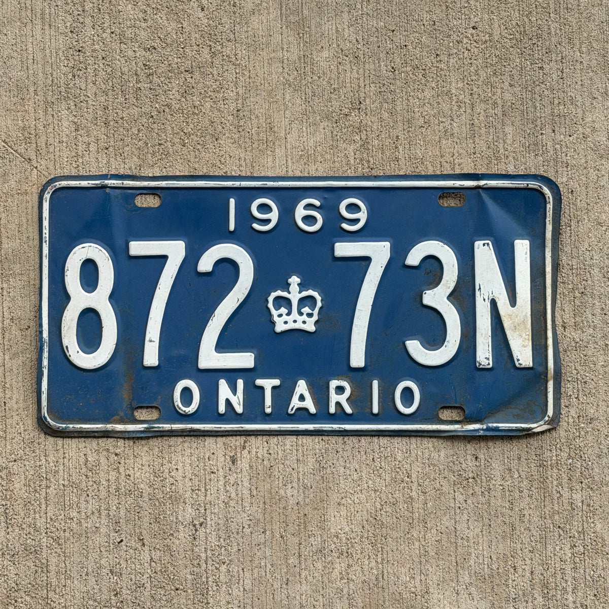 Photo of a 1969 Ontario License Plate Auto Tag Garage Decor Vintage 872 73N with original patina